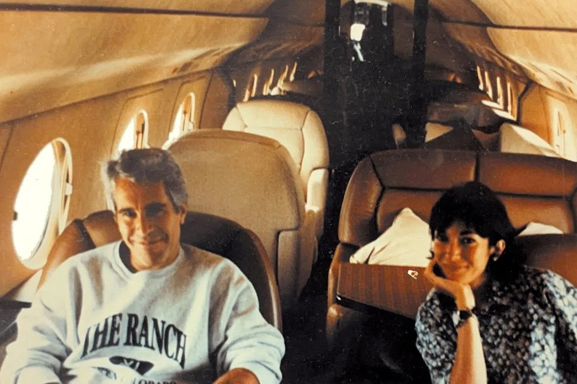 FILE PHOTO: Ghislaine Maxwell and Jeffrey Epstein are seen in this image released by the Department of Justice in Washington, D.C., U.S., on December 19, 2025 as part of a new trove of documents from its investigations into the late financier and convicted sex offender Jeffrey Epstein. U.S. Justice Department/Handout via REUTERS /File Photo