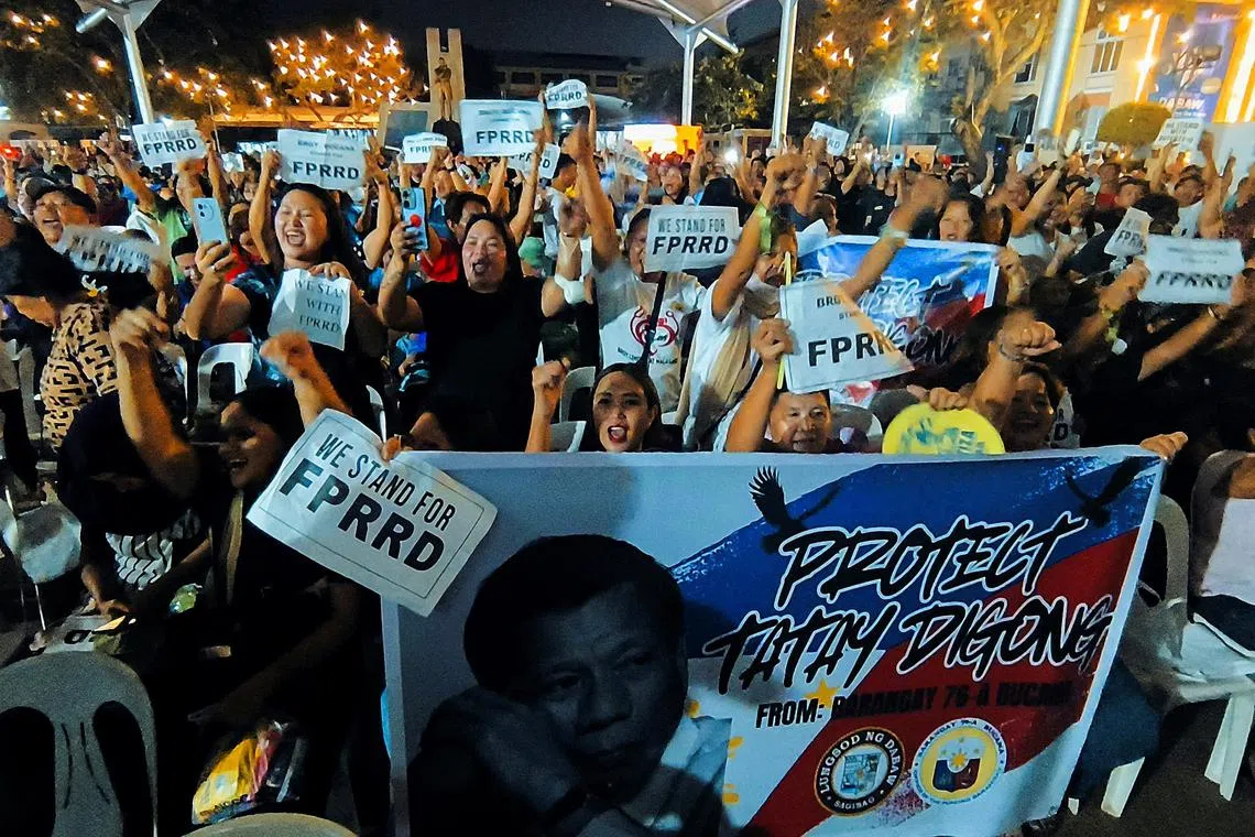 Supporters of former Philippine president Rodrigo Duterte hold a protest after his arrest on March 11.