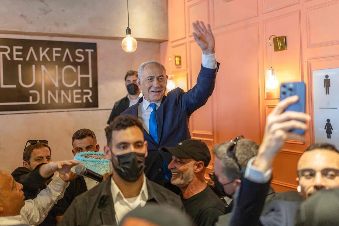 Israeli PM Benjamin Netanyahu (centre) is in the midst of a close race for re-election, with polls showing him more or less in a dead heat with former army chief Gadi Eisenkot.
