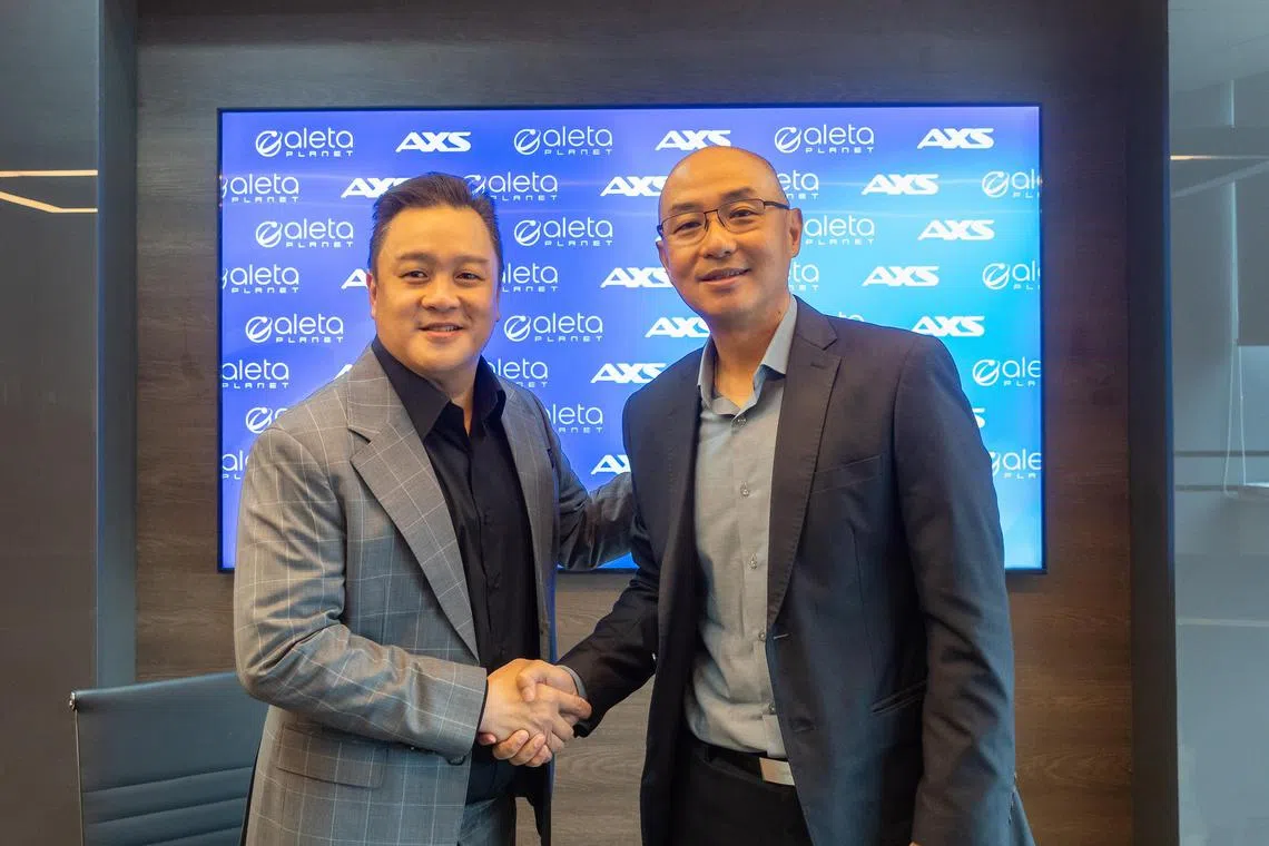 Mr Ryan Gwee, found and group chairman, Aleta Planet and Mr Chin Mun Chung, CEO, AXS Services, signed a partnership agreement to launch remittance services through UnionPay. 