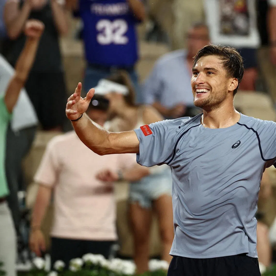 Tennis - French Open - Roland Garros, Paris, France - May 28, 2026 Belgium's Raphael Collignon celebrates after winning his second round match against Ben Shelton of the U.S. REUTERS/Guglielmo Mangiapane