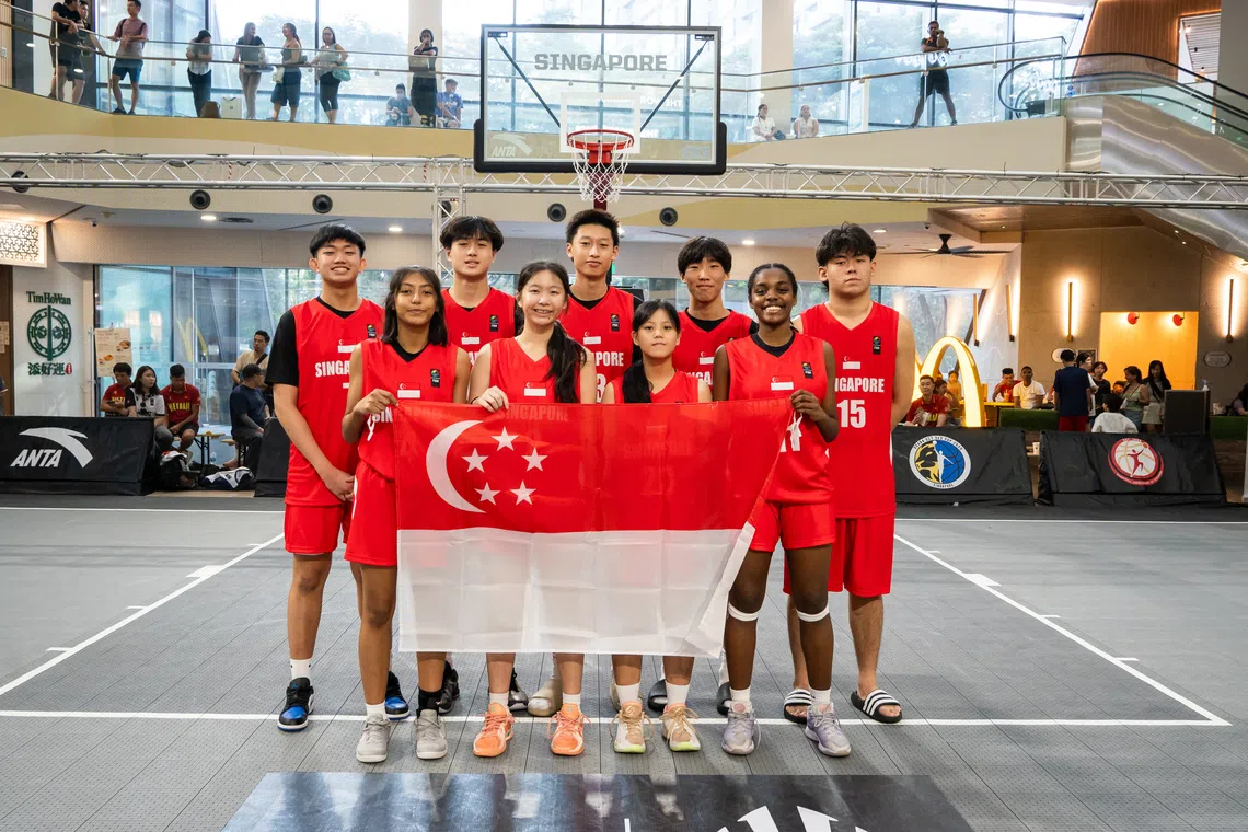 The Singapore boys and girls' players at the South-east Asian U-17 3x3 basketball tournament at the Aperia Mall. 