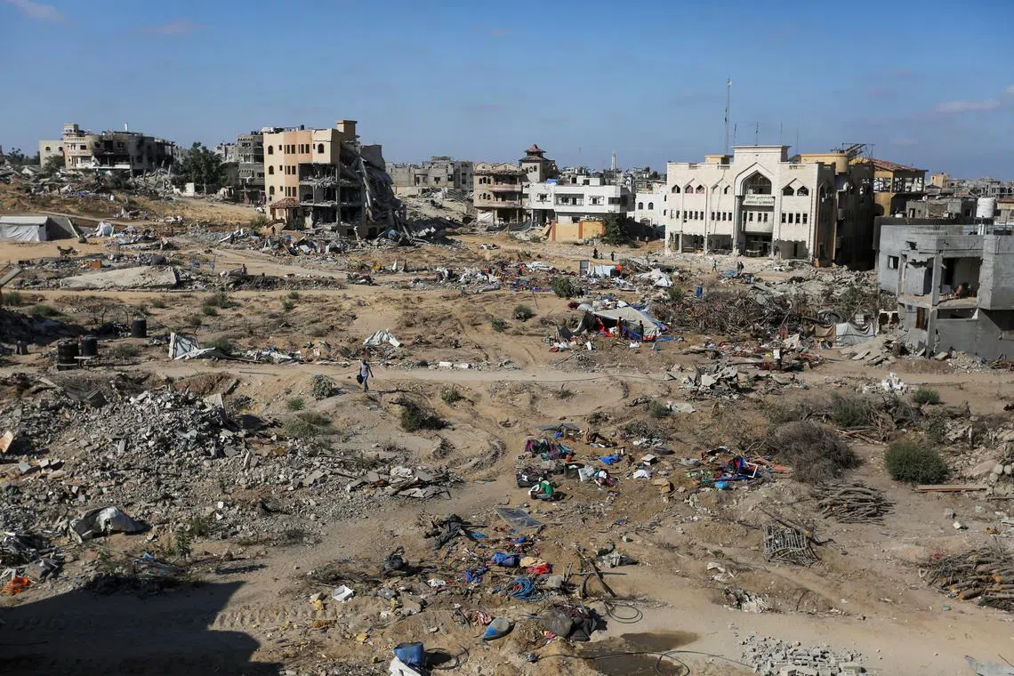 FILE PHOTO: A general view of the damage in the eastern side of Khan Younis as Palestinians make their way to return after Israeli forces pulled out from the area following a raid, amid the Israel-Hamas conflict, in Khan Younis, in the southern Gaza Strip July 30, 2024. REUTERS/Hatem Khaled/File Photo