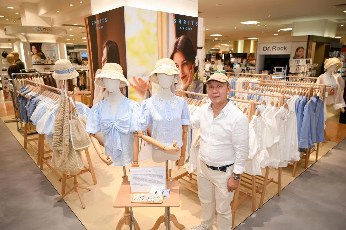 Designer Kelvin Choo at Takashimaya, pictured with shirts from his new brand "Shirts by KVCHY" on  Aug 1, 2025.