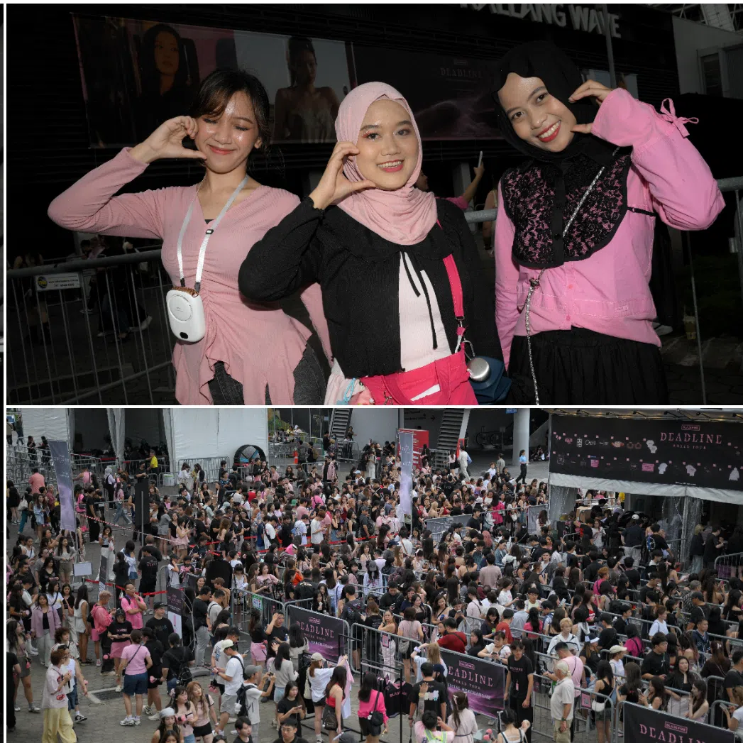Fans posing for pictures and queuing for merchandise ahead of the Blackpink concert at the Singapore Sports Hub on Nov 28.
