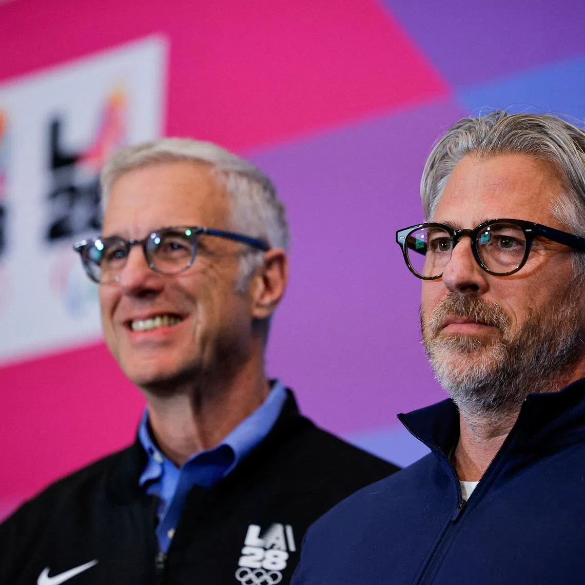 LA28 Chief Executive Officer Reynold Hoover and LA28 Chairperson and President Casey Wasserman pose following a press conference updating progress on the 2028 Olympic Games, in Los Angeles, California, U.S., June 4, 2026.  REUTERS/Mike Blake