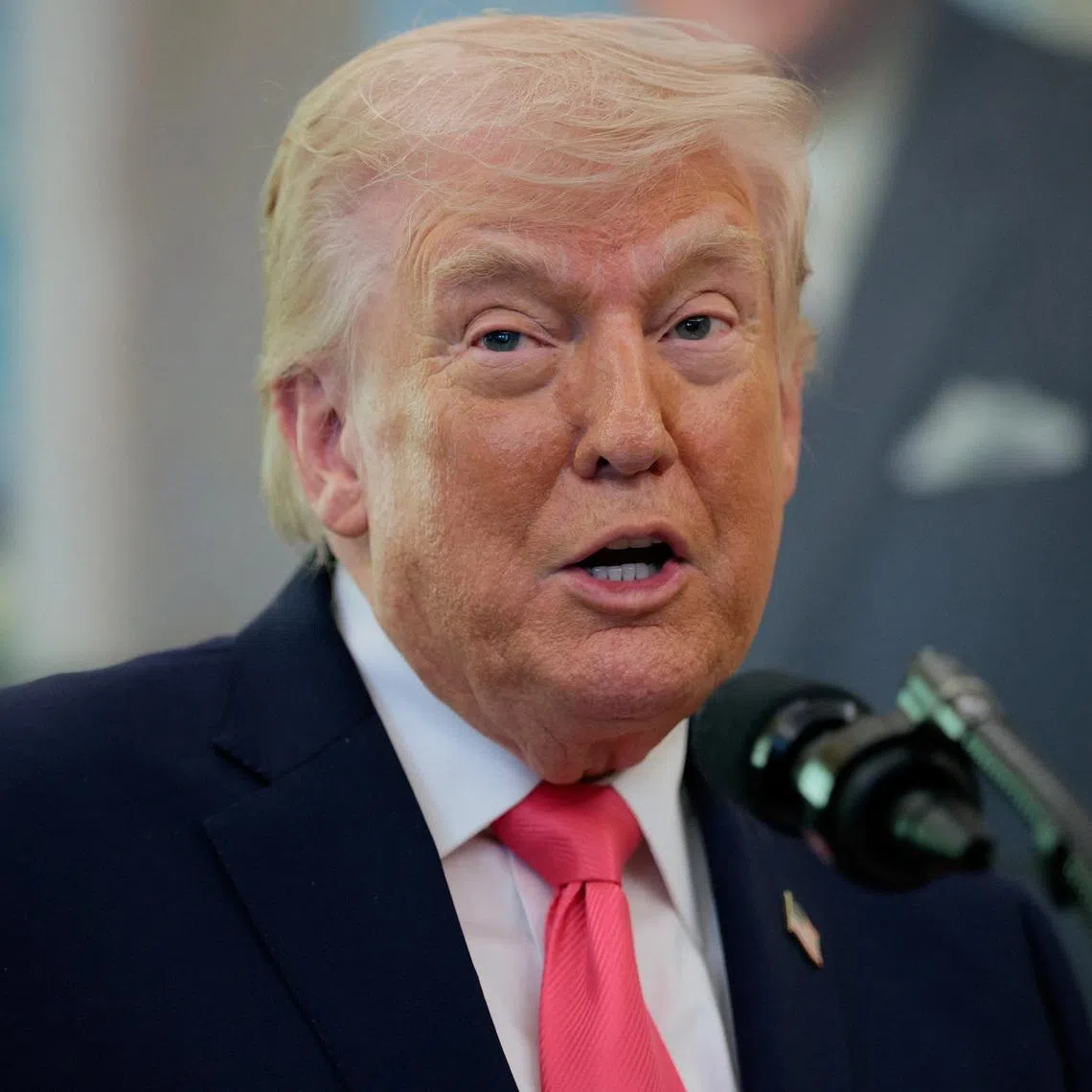 U.S. President Donald Trump speaks as he attends Markwayne Mullin's swearing-in as Department of Homeland Security (DHS) Secretary, at the White House in Washington, D.C., U.S., March 24, 2026. REUTERS/Evan Vucci