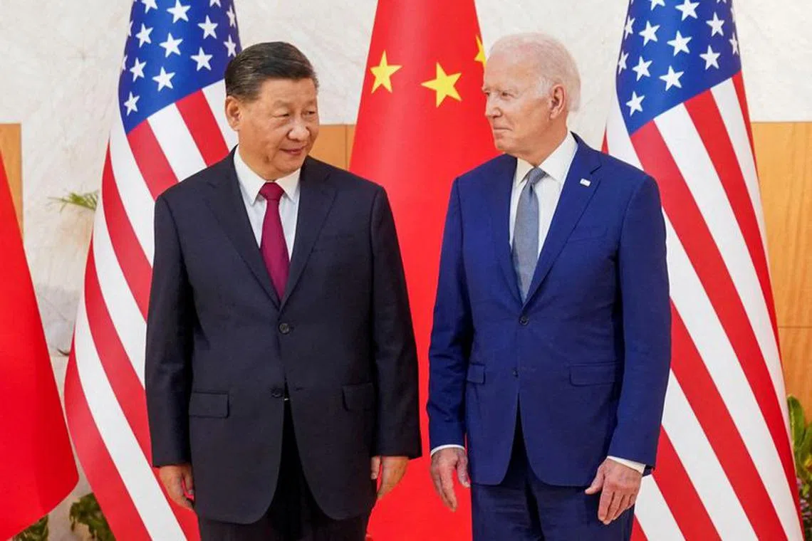 FILE PHOTO: U.S. President Joe Biden meets with Chinese President Xi Jinping on the sidelines of the G20 leaders&#039; summit in Bali, Indonesia, November 14, 2022.  REUTERS/Kevin Lamarque/File Photo