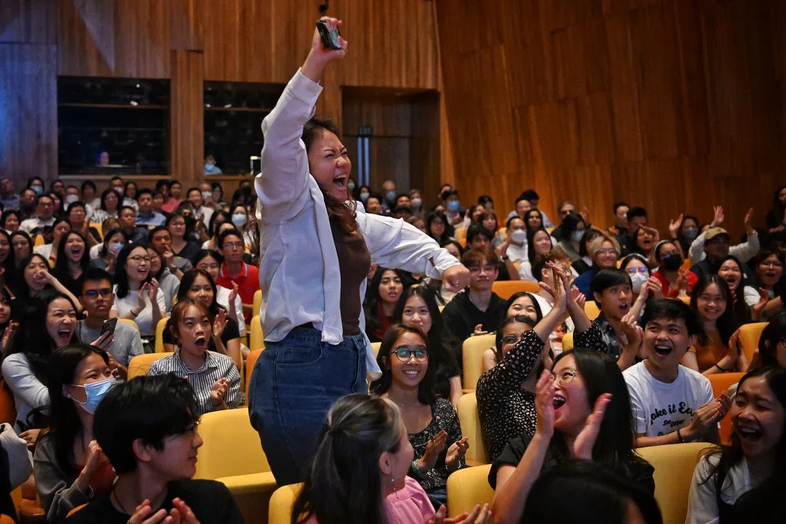 School of the Arts Singapore student Woon Kae celebrates before going on stage to collect her IB results. She scored 44 points.
