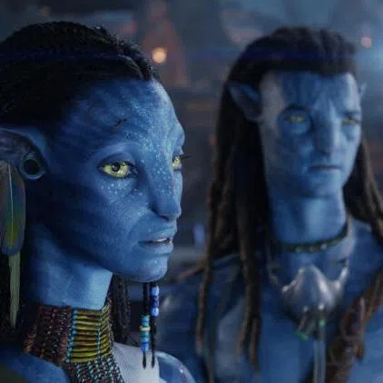 Zoe Saldana (left) and Sam Worthington in Avatar: Fire And Ash.