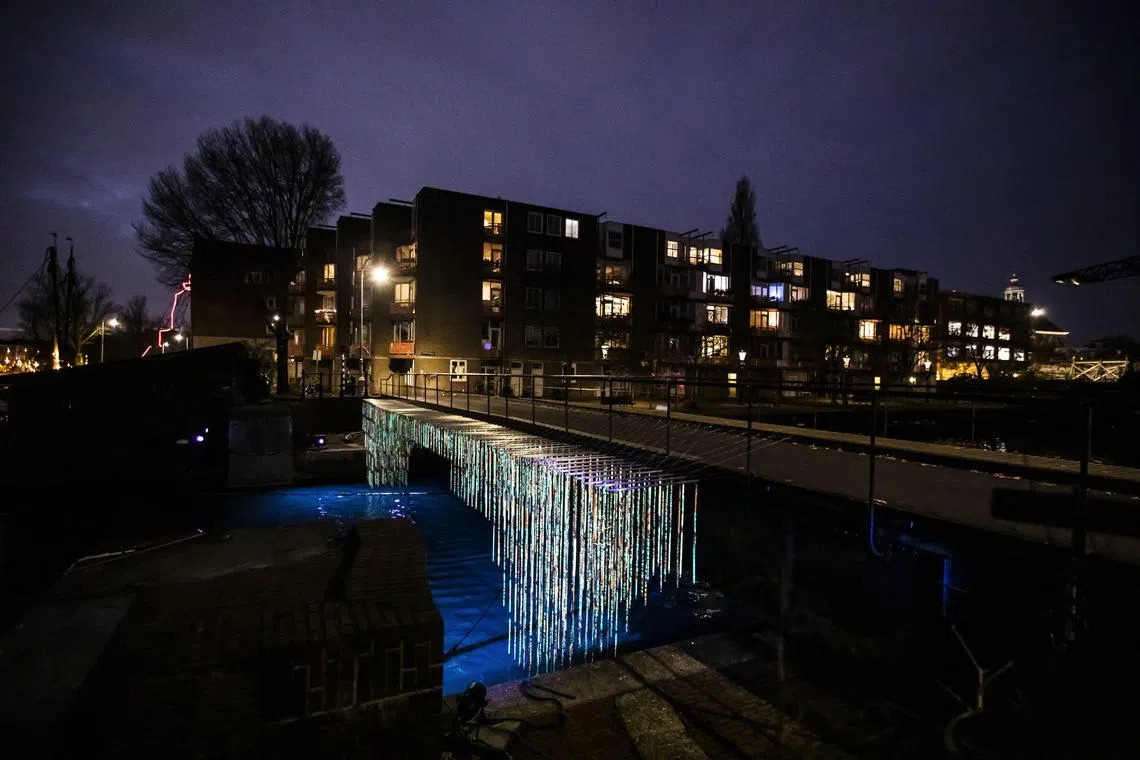 'Bridge of 1000 dreams ' by Studio Toer displayed during the Amsterdam Light Festival 2022. 