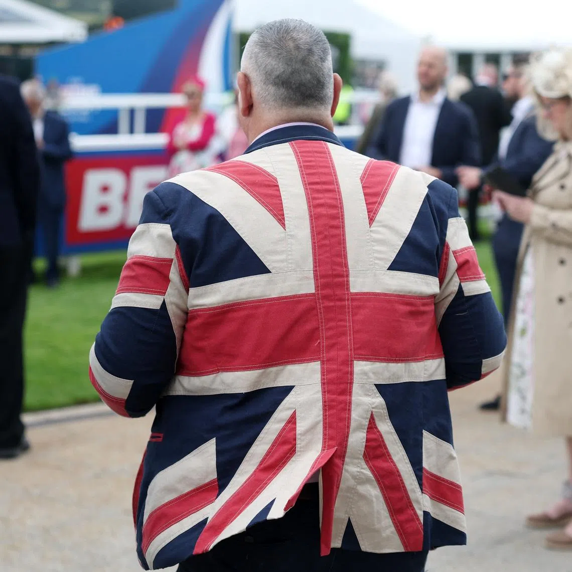 Horse Racing - The Epsom Derby - Epsom Downs Racecourse, Surrey, Britain - June 5, 2026  A racegoer is seen during the races REUTERS/Toby Melville