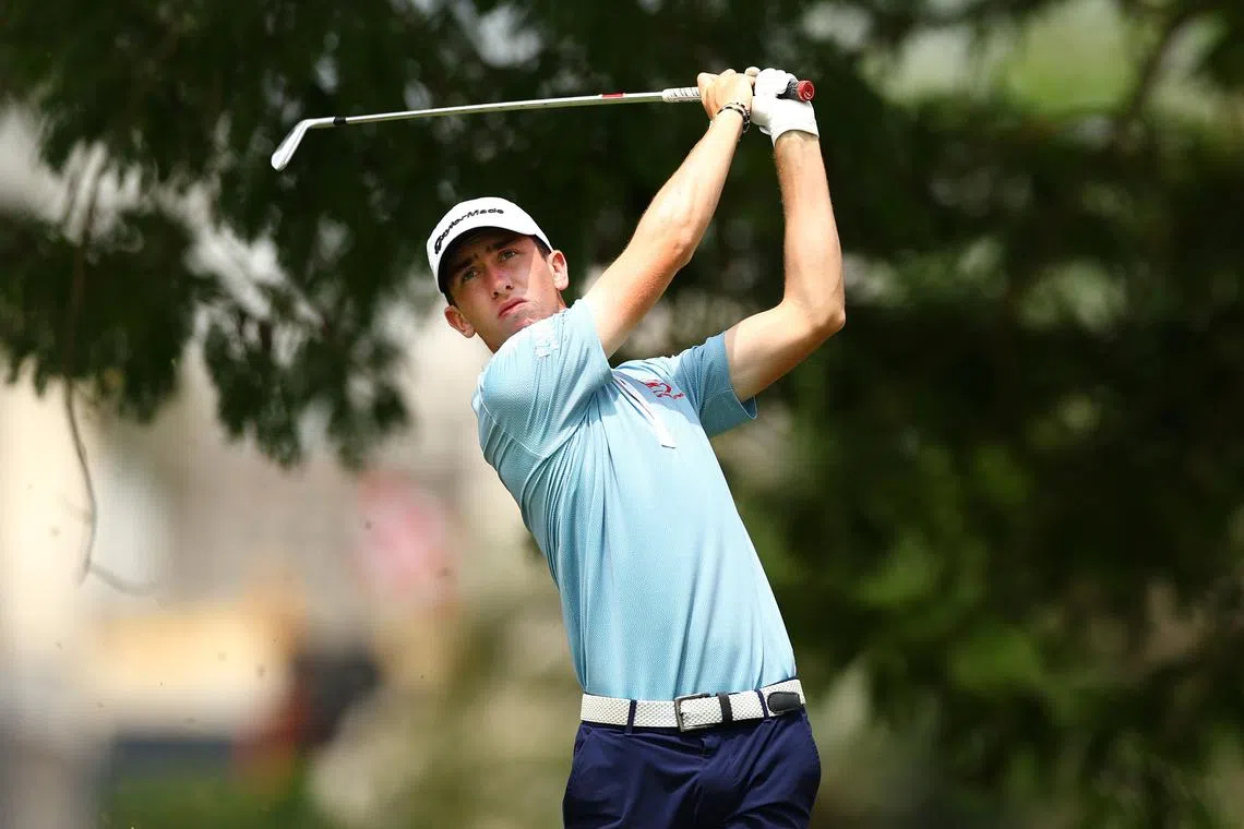 SINGAPORE, SINGAPORE - FEBRUARY 10: Tom McKibbin of Northern Ireland tees off on the 7th hole during Day Two of the Singapore Classic at Laguna National Golf Resort Club on February 10, 2023 in Singapore. (Photo by Yong Teck Lim/Getty Images)