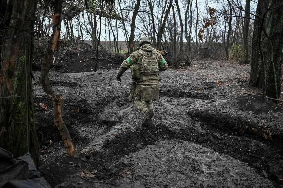 A Ukrainian serviceman on the front line, near the town of Pokrovsk in Ukraine's Donetsk region, on Nov 20.