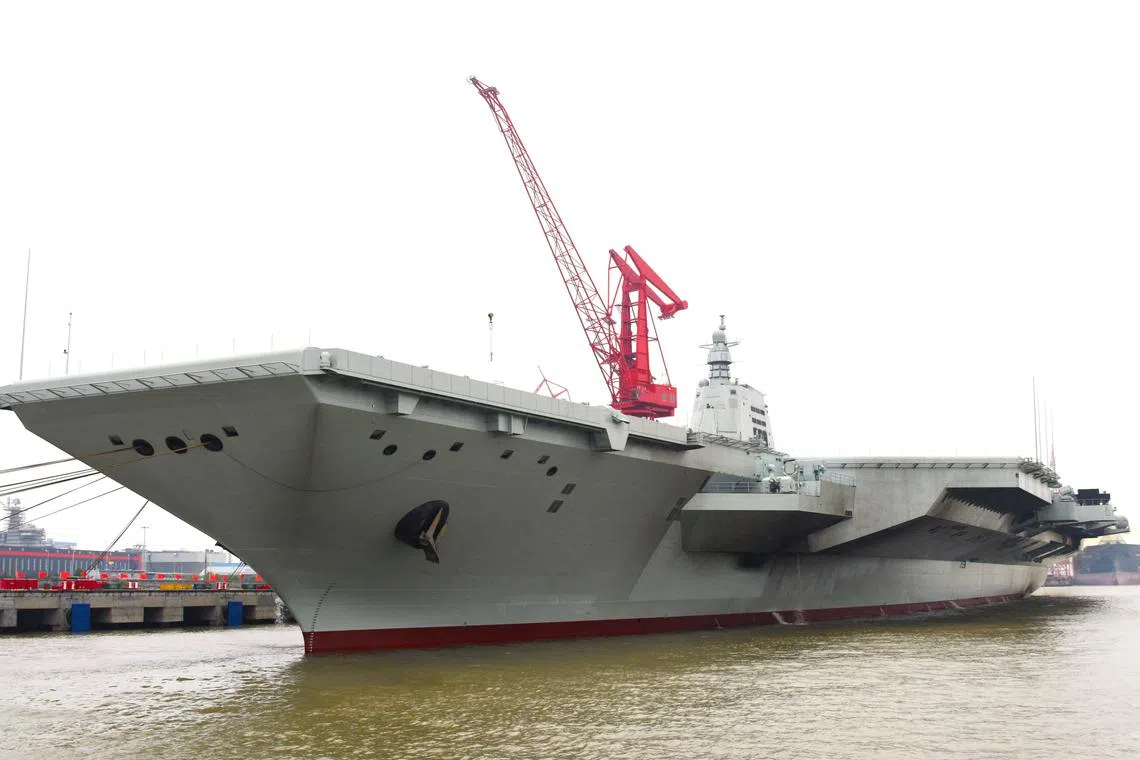 China’s Fujian aircraft carrier took to the water for maiden sea trials on May 1, state media said.