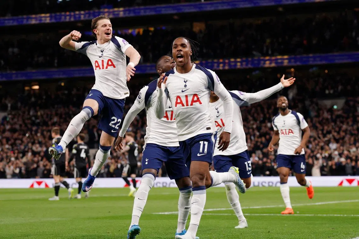 Tottenham Hotspur's Mathys Tel celebrates scoring their first goal with Randal Kolo Muani and Conor Gallagher over Leeds United.