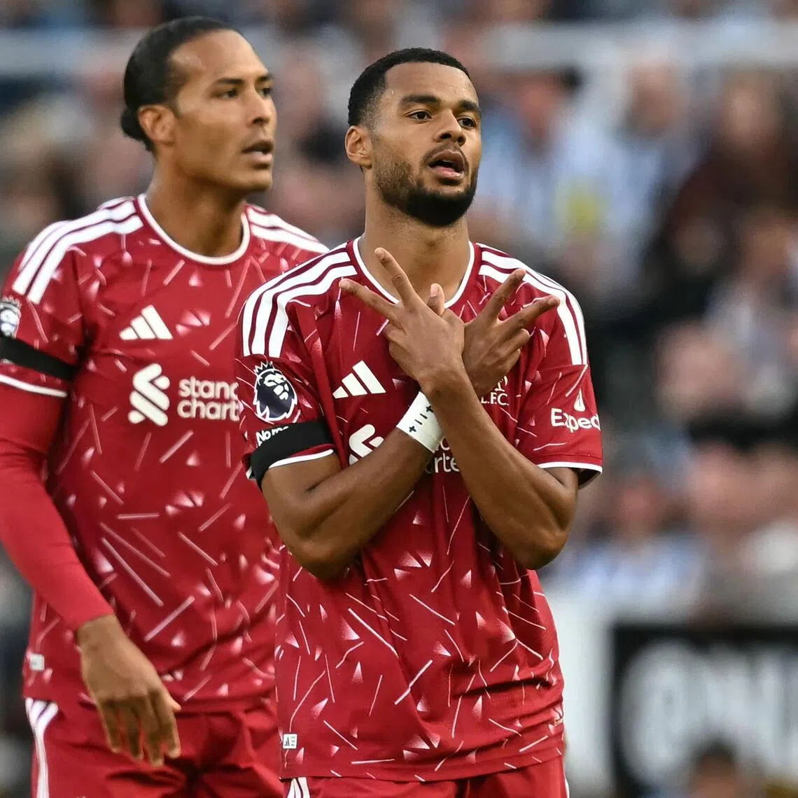 Liverpool’s Dutch forward Cody Gakpo (right) reacting to his goal in the 2-2 English Premier League draw with Newcastle United at St James’ Park on Aug 23 with teammate Virgil van Dijk behind him.