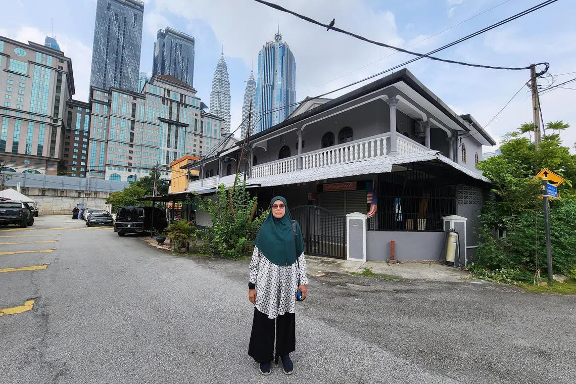 hzevict - Madam Zainab Alias, a third-generation resident of Kampung Sungai Baru located near Kuala Lumpur's iconic Petronas Twin Towers and Golden Triangle, is fighting for fairer compensation for the acquisition of her land by a private developer planning a luxury condominium. 


ST PHOTO: HAZLIN HASSAN