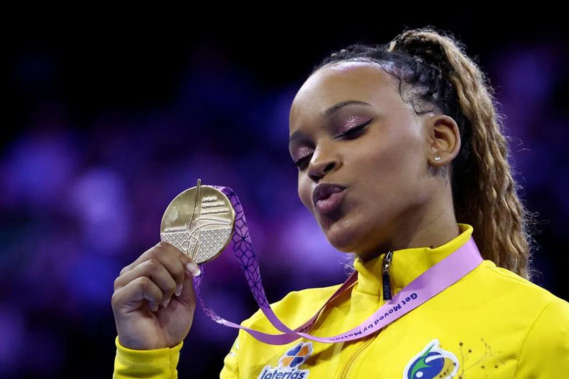 Gymnastics - 2023 World Artistic Gymnastics Championships - Sportpaleis, Antwerp, Belgium - October 7, 2023 Gold medallist Brazil&#039;s Rebeca Andrade celebrates on the podium with her medal after winning the vault exercise at the women&#039;s apparatus finals REUTERS/Yves Herman