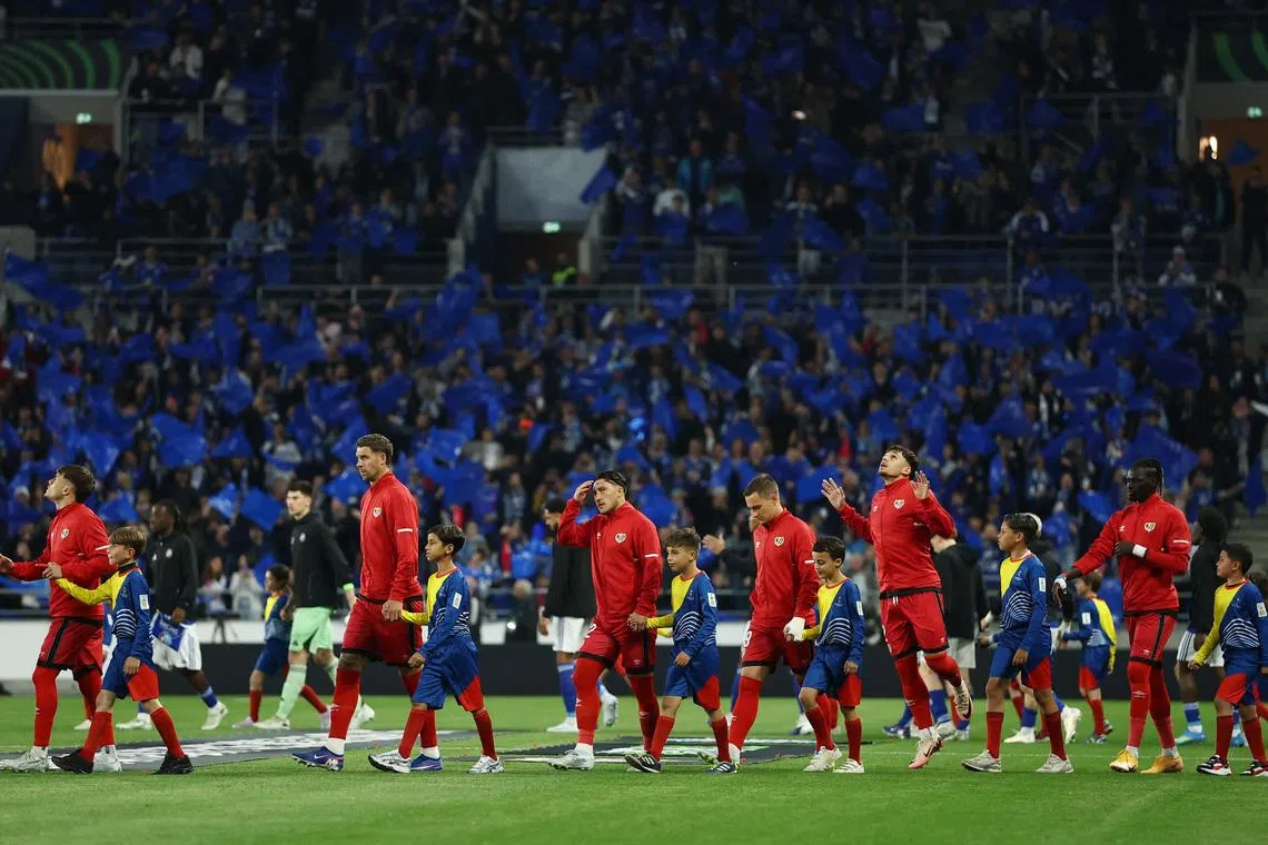 FILE PHOTO: Soccer Football - UEFA Conference League - Semi Final - Second Leg - RC Strasbourg v Rayo Vallecano - Stade de la Meinau, Strasbourg, France - May 7, 2026  Rayo Vallecano players walk onto the pitch before the match REUTERS/Christian Hartmann/ File Photo