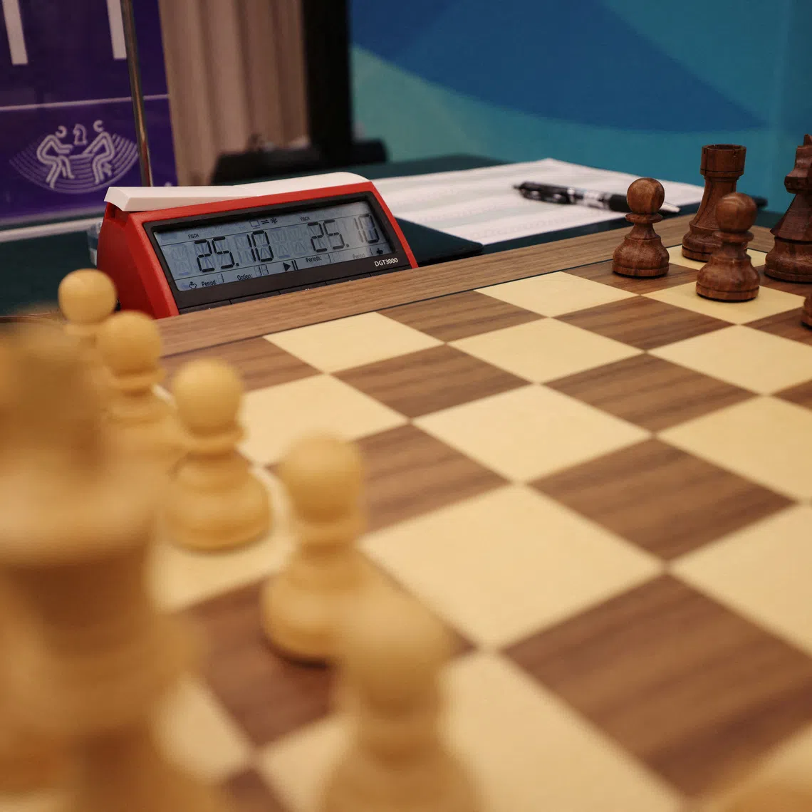 FILE PHOTO: Asian Games - Hangzhou 2022 - Chess - Hangzhou Qi-Yuan (Zhili) Chess Hall, Hangzhou, China - September 24, 2023 General view of chessboard during Women's Individual Round 1 REUTERS/Stanley Cheah/File Photo