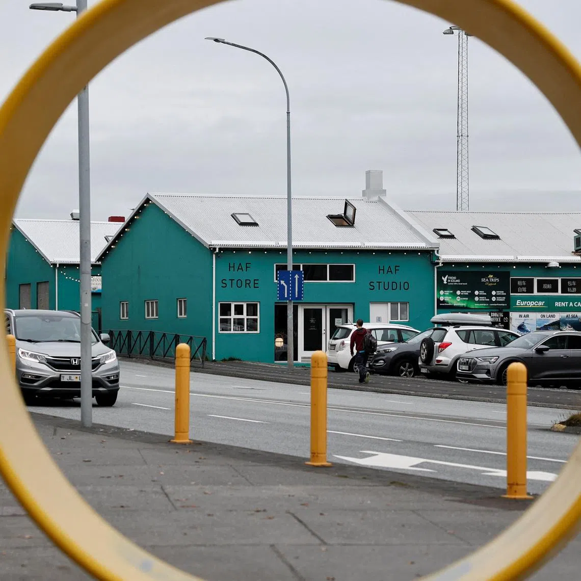Cars are parked on the Old Harbour area of Reykjavik, Iceland, October 13, 2025. REUTERS/Benoit Tessier