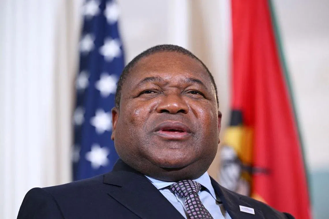 FILE PHOTO: Mozambique President Filipe Jacinto Nyusi speaks to reporters ahead of a meeting with U.S. Secretary of State Antony Blinken during the US-Africa Leaders Summit at the Walter E. Washington Convention Center in Washington, DC, U.S., December 14, 2022. Mandel Ngan/Pool via REUTERS/File Photo
