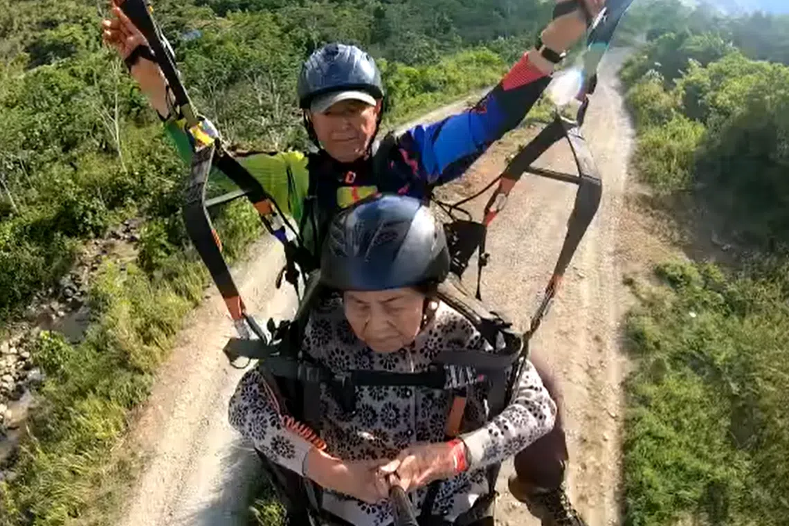 Mr Lammert said 87-year-old Madam Thong was calm during the paragliding activity.