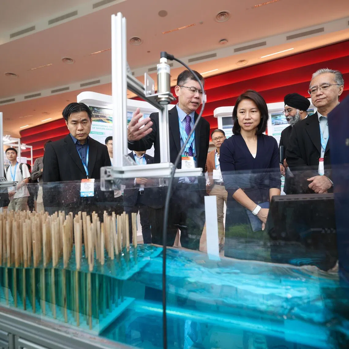 Senior Parliamentary Secretary for the Ministry of Sustainability and the Environment Goh Hanyan (3rd from right) at CFI Singapore’s 3rd Annual Symposium on Oct 21.