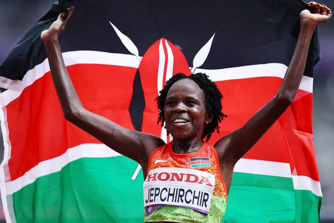 World Athletics Championships Tokyo 2025 - Women's Marathon Final - Japan National Stadium, Tokyo, Japan - September 14, 2025 Kenya's Peres Jepchirchir celebrates after winning the Women's Marathon Final REUTERS/Sarah Meyssonnier