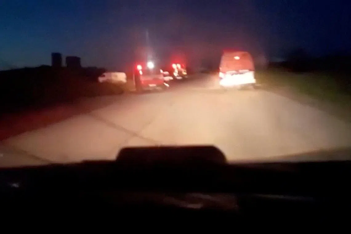 FILE PHOTO: A screenshot taken from a video published by the Palestinian Red Crescent and obtained from cellphone of killed paramedic, shows the last moments during the incident in which aid workers were killed in Israeli fire, according to the Palestinian Red Crescent, in the southern Gaza Strip, March 23, 2025. Palestinian Red Crescent/Handout via REUTERS/File Photo