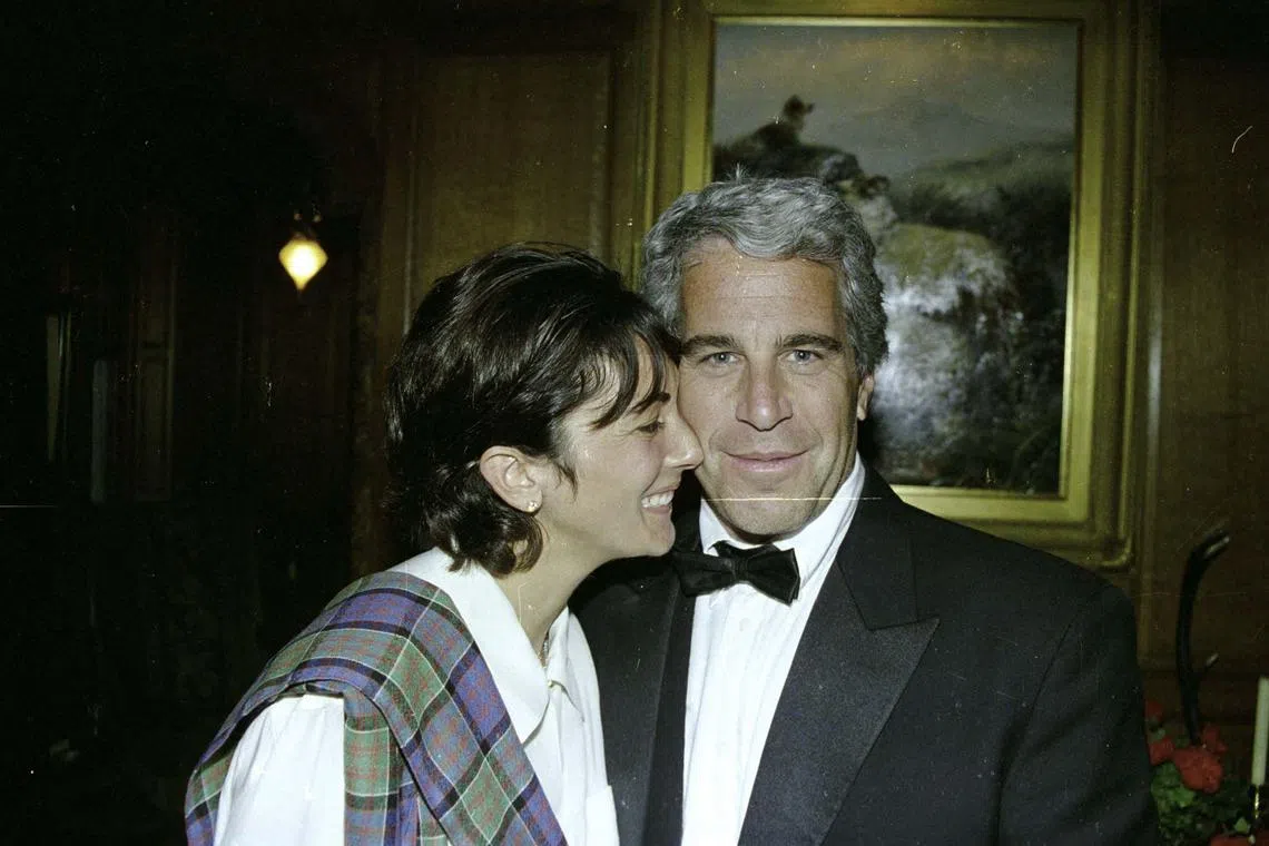(FILES) This undated trial evidence image obtained December 8, 2021, from the US District Court for the Southern District of New York shows British socialite Ghislaine Maxwell and US financier Jeffrey Epstein. US President Donald Trump on July 17, 2025 threatened to sue The Wall Street Journal after it published a story about an alleged off-color letter written by him to the late disgraced financier Jeffrey Epstein that featured a drawing of a naked woman. Trump is facing the most serious split in his loyal right-wing base since he returned to power over claims his administration is covering up lurid details of Epstein's crimes to protect rich and powerful figures. (Photo by Handout / US District Court for the Southern District of New York / AFP) / RESTRICTED TO EDITORIAL USE - MANDATORY CREDIT "AFP PHOTO / US District Court for the Southern District of New York" - NO MARKETING - NO ADVERTISING CAMPAIGNS - DISTRIBUTED AS A SERVICE TO CLIENTS