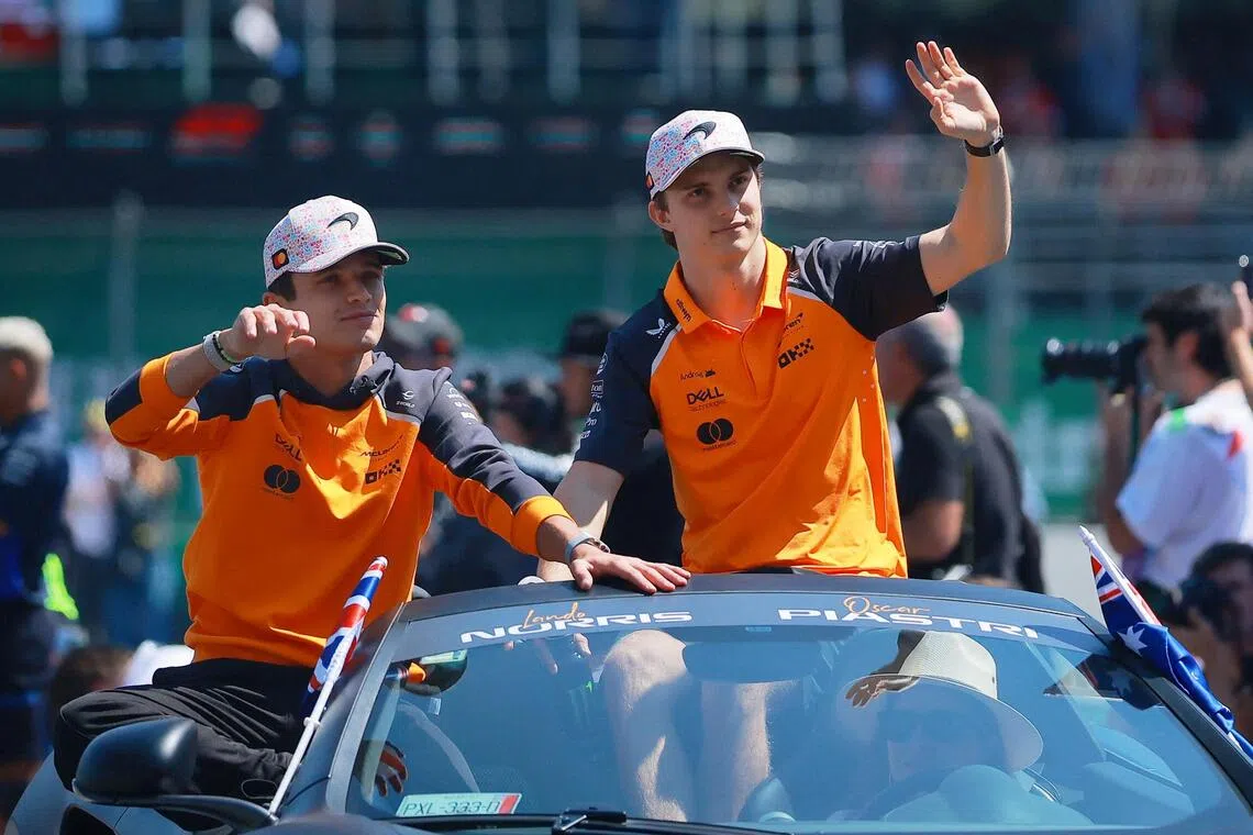 McLaren's Lando Norris (left) leads the drivers' championship by one point, ahead of his McLaren team-mate Oscar Piastri.