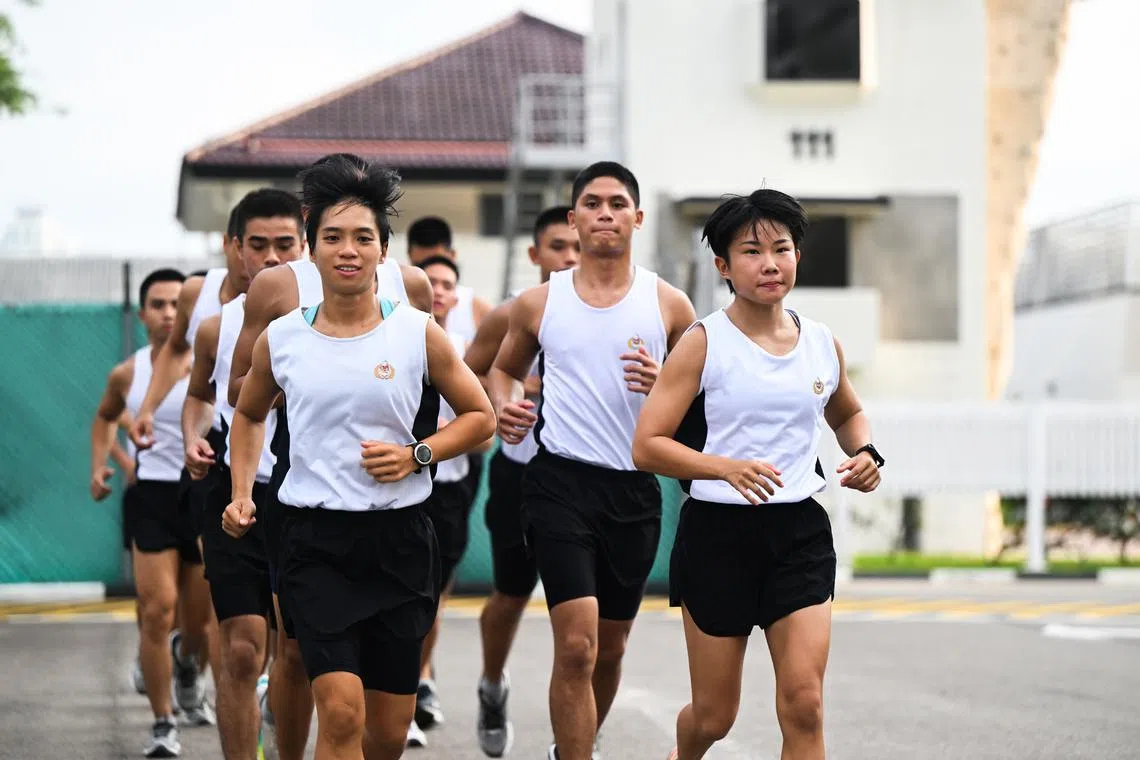 Captain Angelia Tan (left) and Capt Jhosy Ng graduated from the 60th edition of the course along with 68 other male trainees.