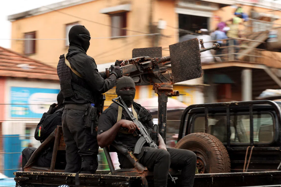 Soldiers patrol on the main road in Bissau, Guinea-Bissau, November 21, 2025. REUTERS/Luc Gnago
