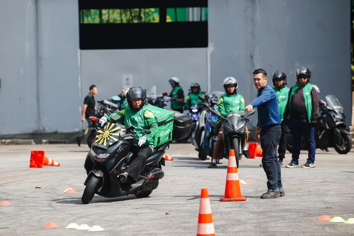 Grab has launched a safety riding programme for delivery workers to learn how to manoeuvre their motorcycles with loaded bags and in tight spaces, among other skills.
