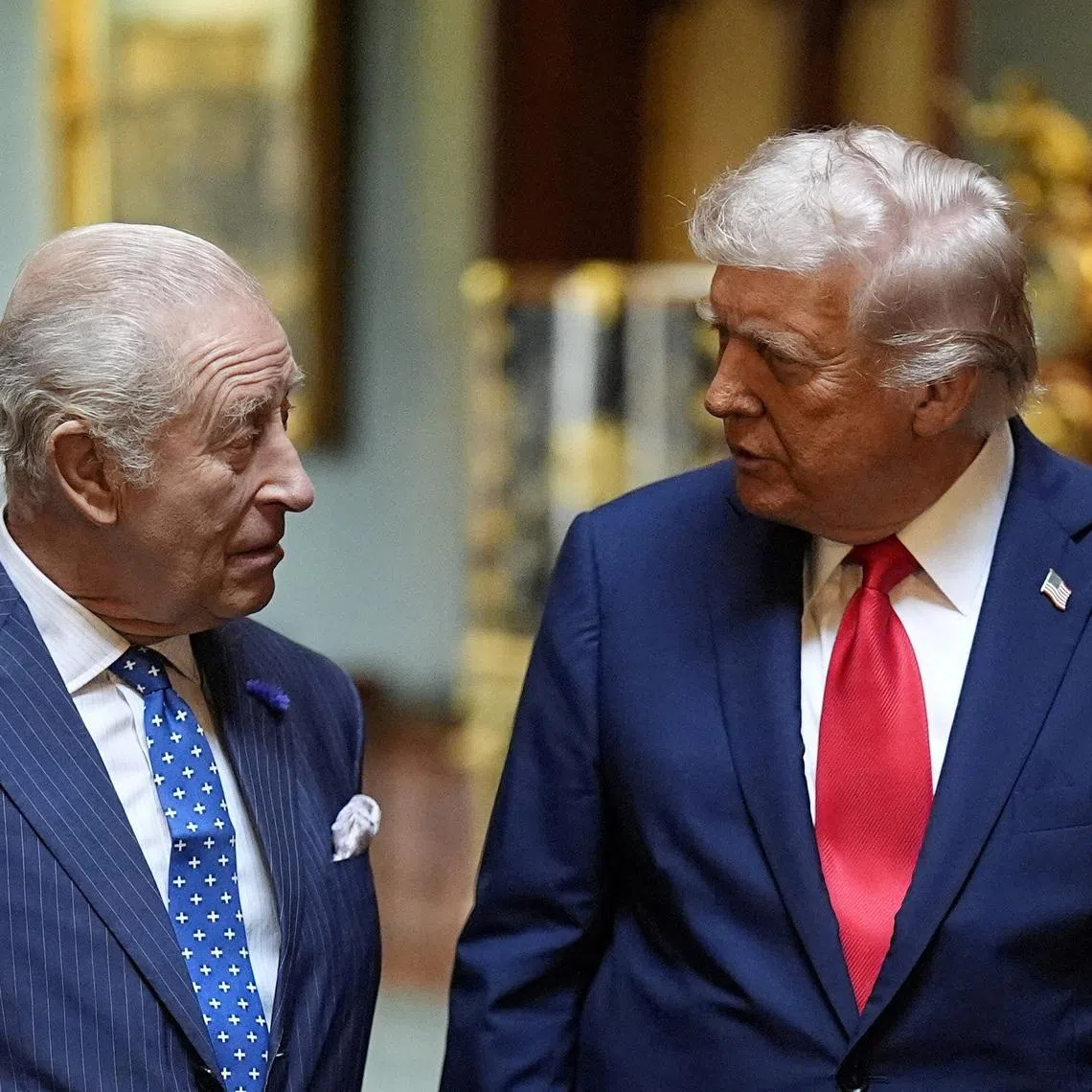 FILE PHOTO: King Charles III (left) with US President Donald Trump at Windsor Castle, Berkshire, before formally bidding farewell to the president on day two of their state visit to the UK, September 18, 2025.    Aaron Chown/Pool via REUTERS/File Photo
