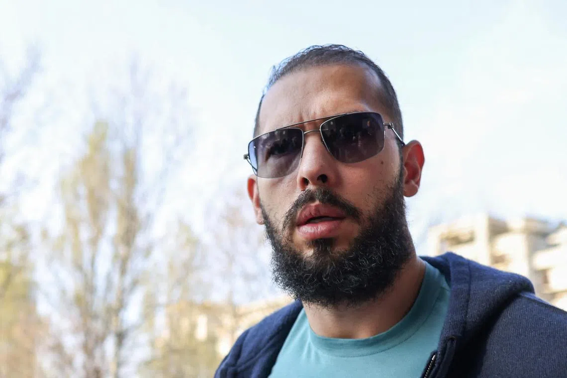 Andrew Tate arrives at Directorate for Investigating Organized Crime and Terrorism (DIICOT), in Bucharest, Romania, April 10, 2023. Inquam Photos/Sabin Cirstoveanu via REUTERS ATTENTION EDITORS - THIS IMAGE WAS PROVIDED BY A THIRD PARTY. ROMANIA OUT. NO COMMERCIAL OR EDITORIAL SALES IN ROMANIA