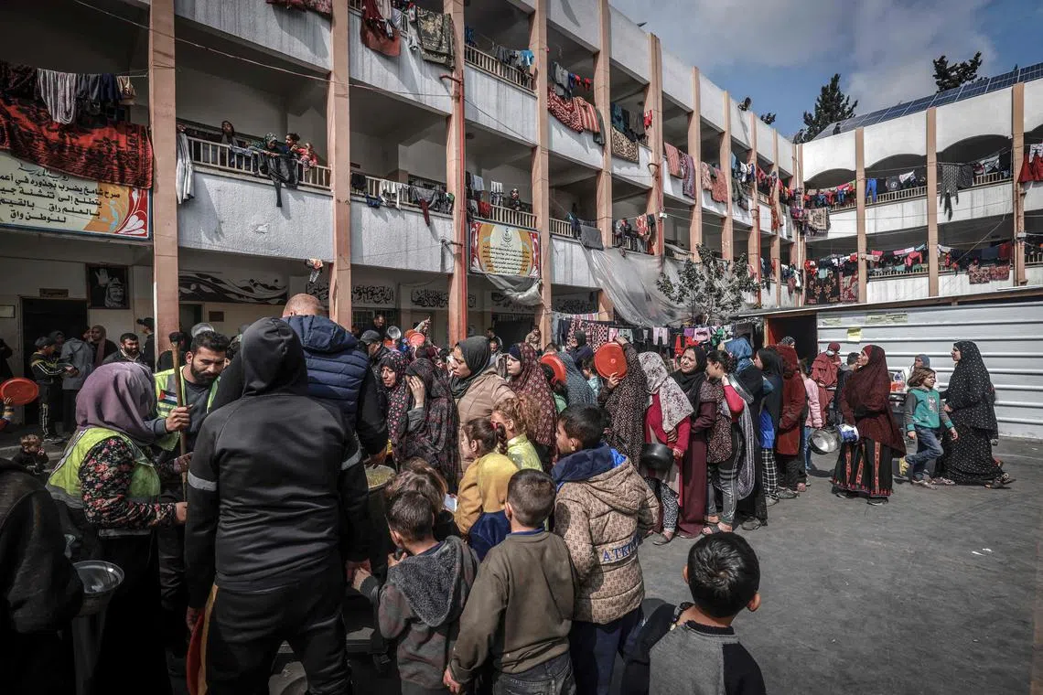 Displaced Palestinians at a government school in Rafah in the southern Gaza Strip on Feb 19, 2024.