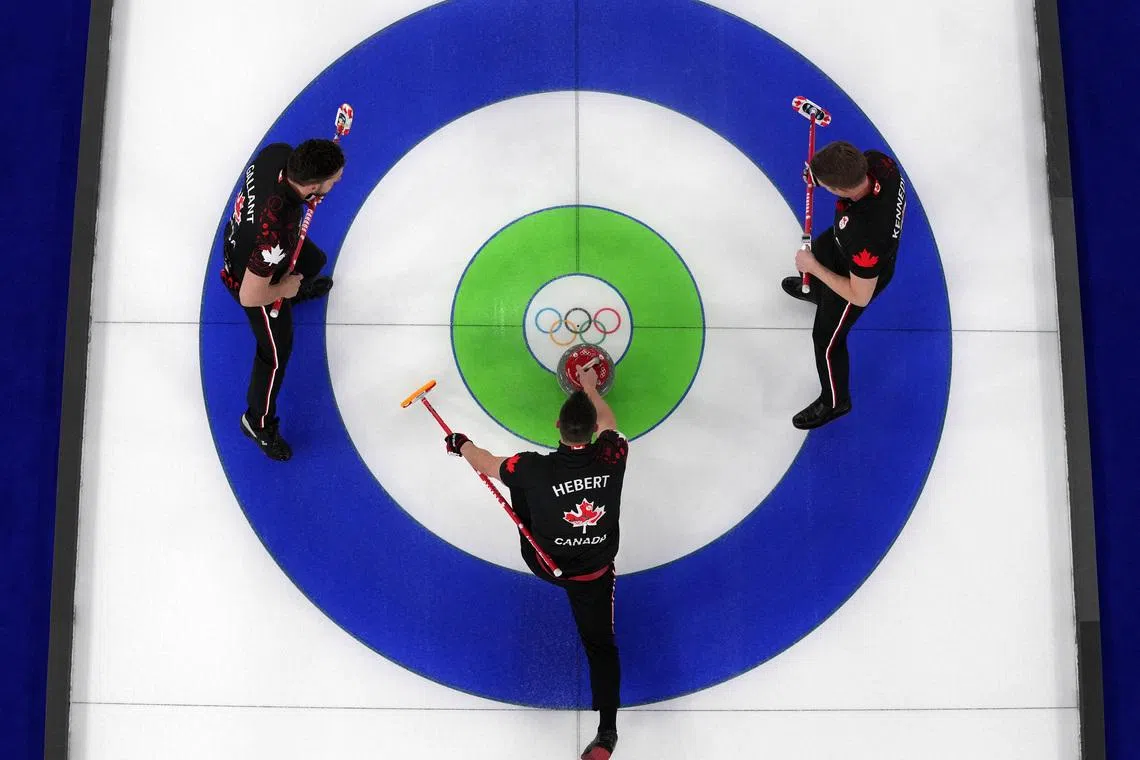Milano Cortina 2026 Olympics - Curling - Men's Round Robin Session 1 - Canada vs Germany - Cortina Curling Olympic Stadium, Cortina d'Ampezzo, Italy - February 11, 2026. Brett Gallant of Canada, Ben Hebert of Canada and Marc Kennedy of Canada in action during Men's Round Robin Session 1. REUTERS/Issei Kato/File Photo