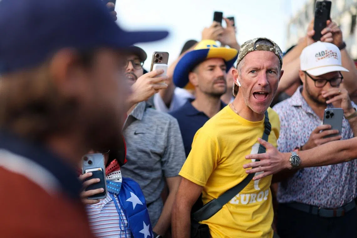 A fan reacting as Tommy Fleetwood of Team Europe walking the first hole during the Sept 27 foursomes matches of the 2025 Ryder Cup at Black Course at Bethpage State Park Golf Course in Farmingdale, New York.   