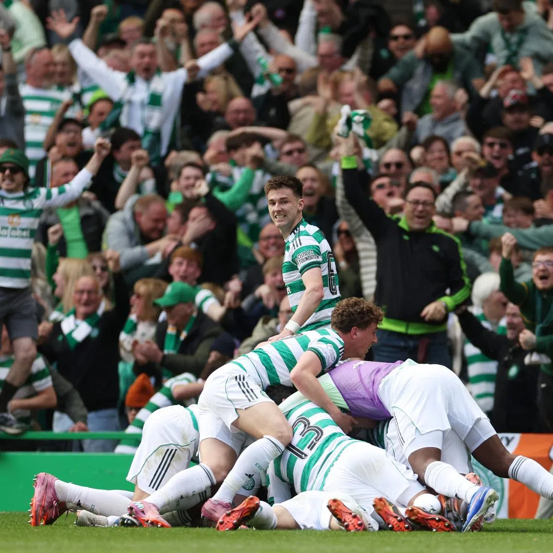 Soccer Football - Scottish Premiership - Celtic v Rangers - Celtic Park, Glasgow, Scotland, Britain - May 10, 2026 Celtic's Daizen Maeda celebrates scoring their third goal with teammates REUTERS/Russell Cheyne