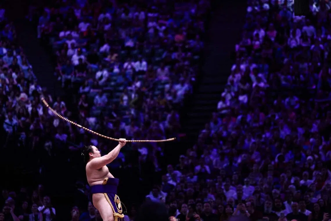 A sumo wrestler performing during the Bow-twirling ceremony, on day two of the 2026 Paris Sumo Tournament, in Paris, on June 14, 2026.