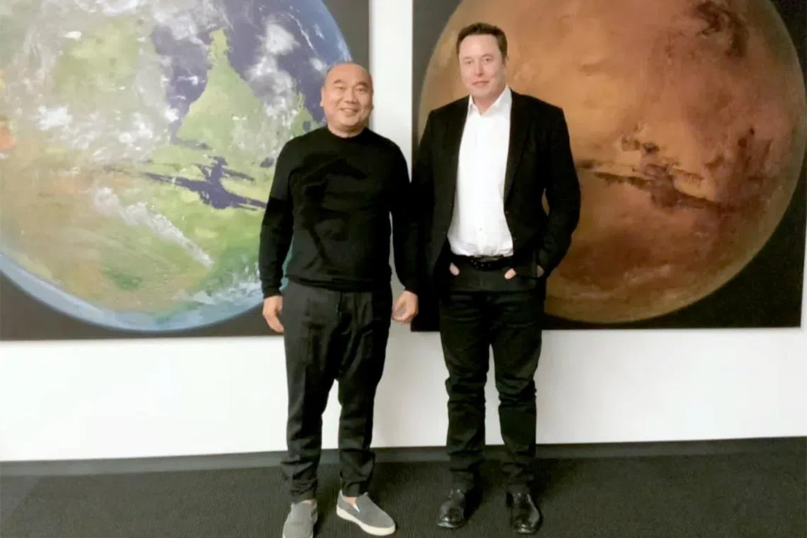 Singapore-based Leo KoGuan (left) with Tesla CEO Elon Musk at the Spacex office on Oct 10, 2019.