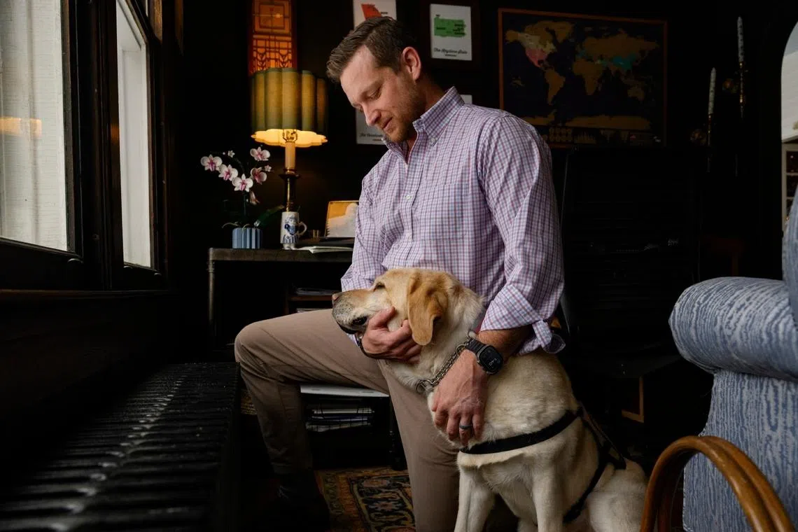 Party the service dog will climb into Dr Marshall Bahr's lap during panic attacks and break the tension when he meets someone new.