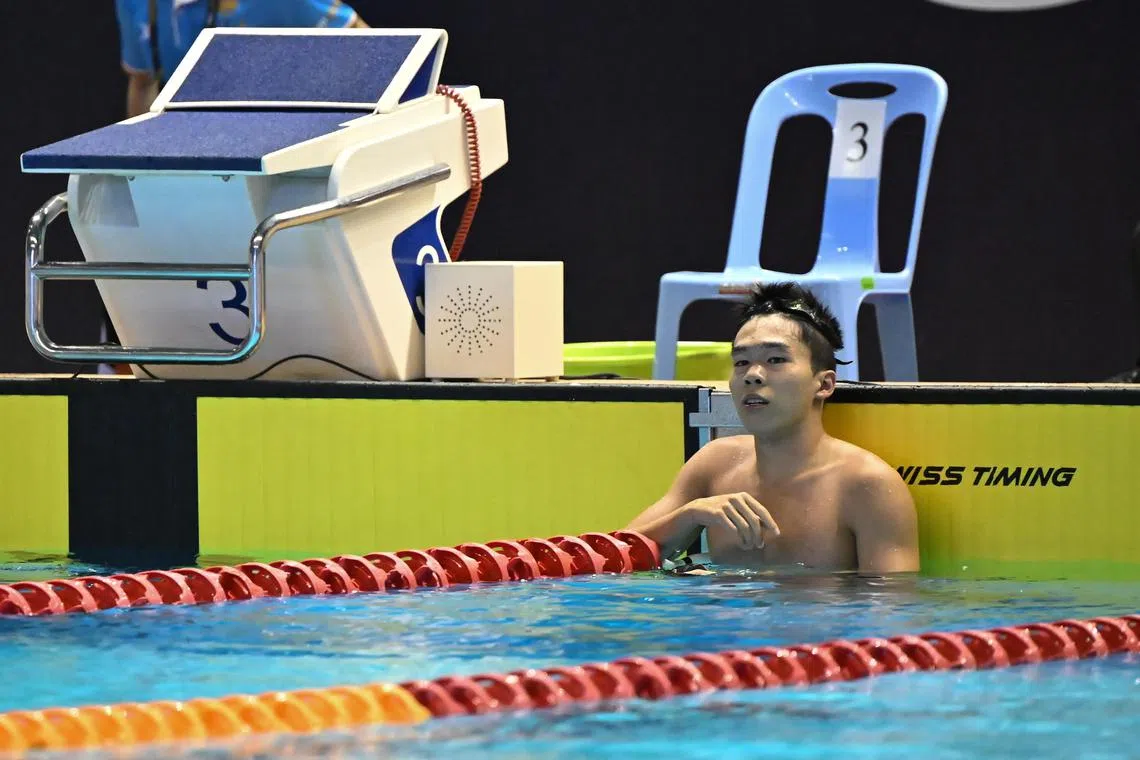 Jonathan Tan (above) finishes first in the men's 50m freestyle final at Morodok Techo Aquatics Centre on Sunday, with a time of 21.95 seconds, ahead of teammate Teong Tzen Wei (22.50) and Vietnam’s Jeremie Luong (22.84).