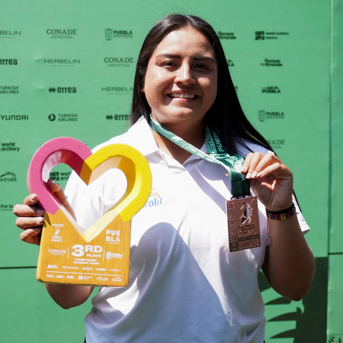 Mexican archer Dafne Quintero poses with a bronze medal at the Stage 1 Archery World Cup, in Puebla, Mexico, April 11, 2026. REUTERS/Angelica Medina