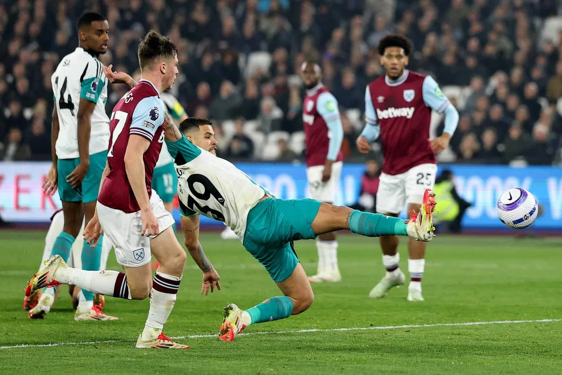 Soccer Football - Premier League - West Ham United v Newcastle United - London Stadium, London, Britain - March 10, 2025 Newcastle United's Bruno Guimaraes scores their first goal REUTERS/Toby Melville