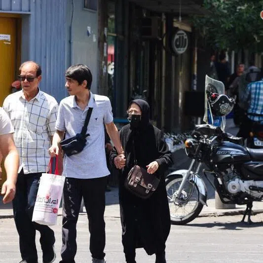 People crossing a street in central Tehran on June 8, 2026. Iran has said that it attack again if Israel persisted with its strikes in Lebanon.