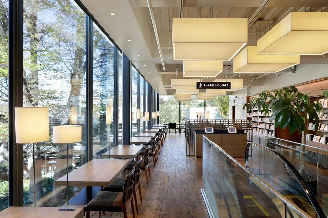 A view of the Share Lounge co-working space within Tsutaya Bookstore at Daikanyama T-Site in Tokyo.